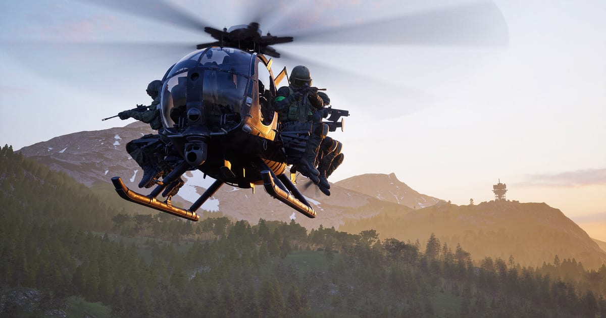 WARDOGS screenshot of a small black helicopter flying low over a forested mountain valley at sunset with soldiers sitting on its side benches, rifles ready